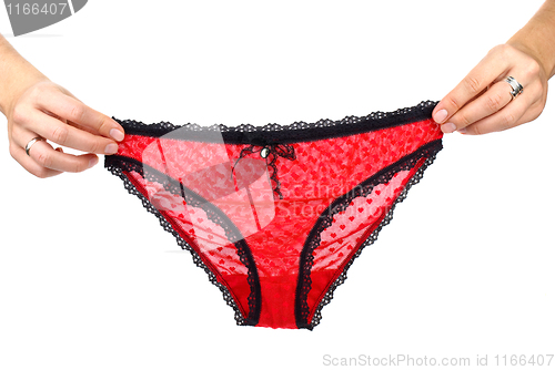 Image of Hands holding sexy red woman's panties