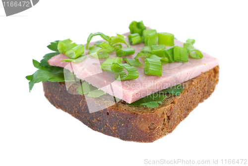 Image of Ham sandwich with rye bread, parsley and spring onion