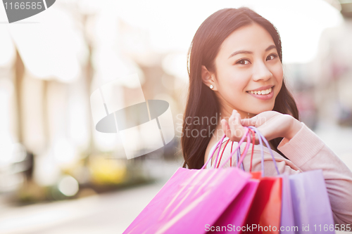 Image of Asian woman shopping