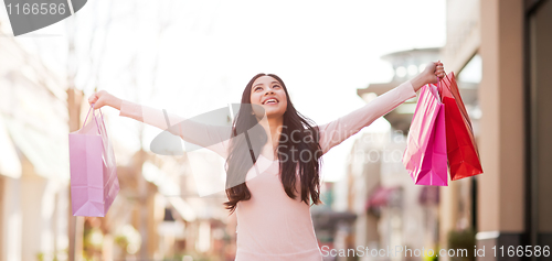 Image of Asian woman shopping