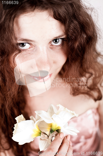 Image of beautiful woman with narcissus