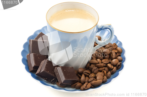 Image of Coffee cup with chocolate and coffee beans