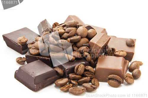 Image of Heap of coffe beans and chocolate on white