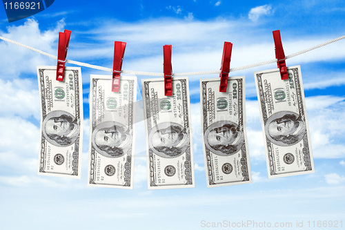 Image of Dollars on rope.