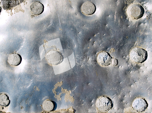 Image of Riveted metal sheet.