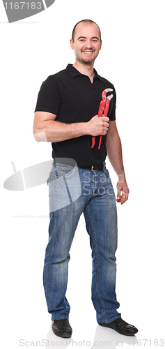 Image of man with tool