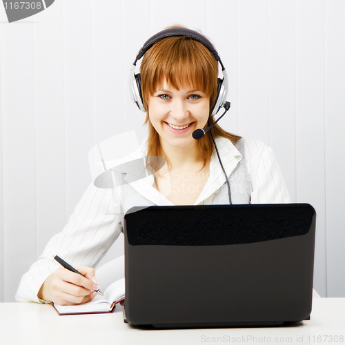 Image of girl in headphones with a microphone