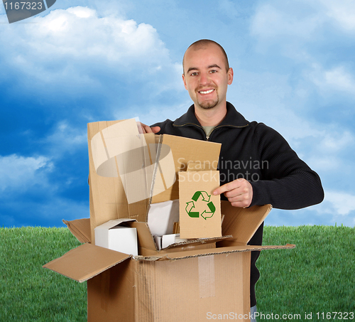 Image of grass and sky man recycling paper