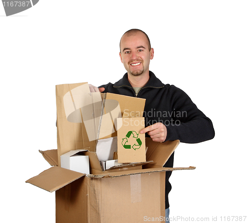 Image of young man recycling cardboard