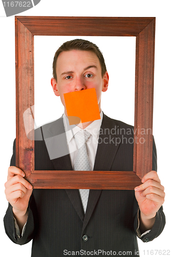 Image of Businessman with wooden frame