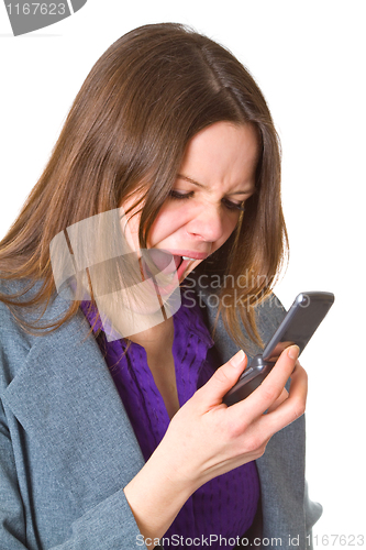 Image of Business woman screaming in her cellphone
