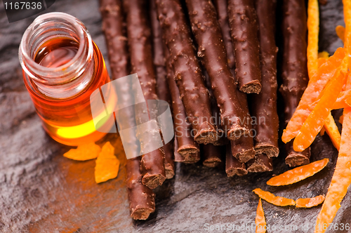 Image of chocolate sticks with orange