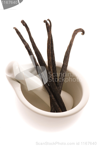 Image of mortar with vanilla pods 