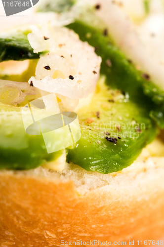 Image of Sandwich with avocado on a wooden board 