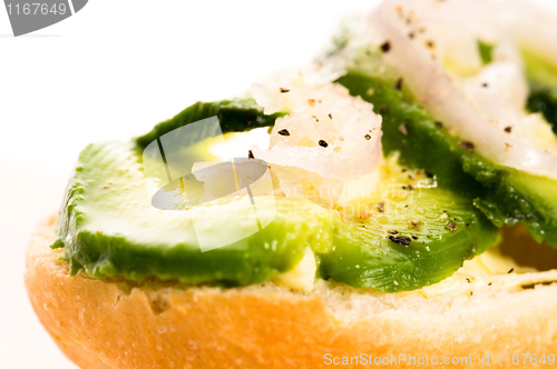 Image of Sandwich with avocado on a wooden board 