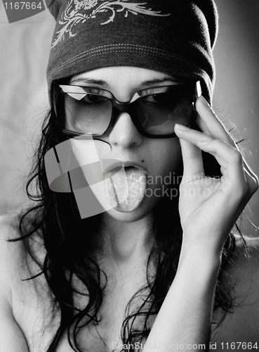Image of Girl shows her tongue
