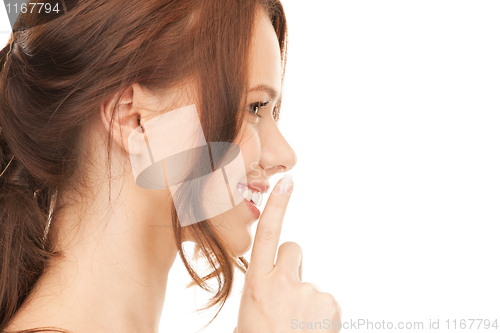 Image of finger on lips