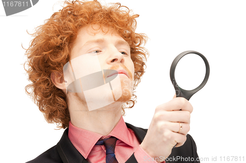 Image of man with magnifying glass