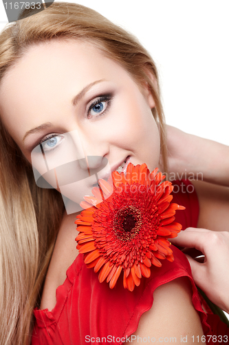 Image of Young lady with red gerbera