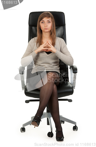 Image of girl sitting in a chair