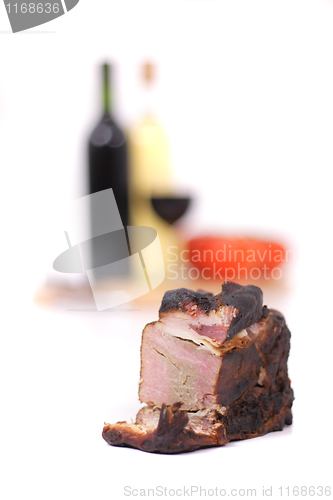 Image of wine and smoked meat