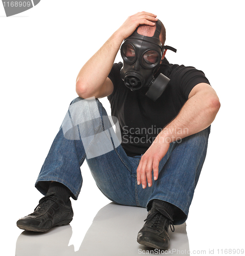 Image of stressed man with gas mask