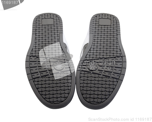 Image of Sneakers soles upward