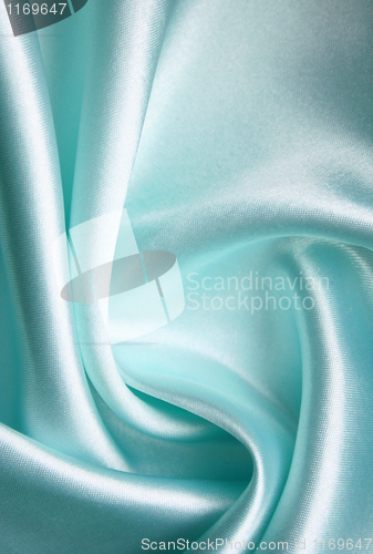Image of Smooth elegant blue silk as background 