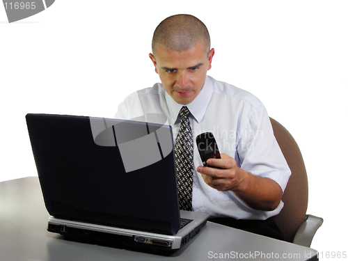 Image of Businessman at the office desk