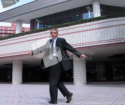 Image of Businessman turning