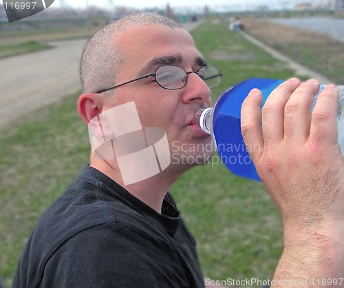 Image of Man drinking