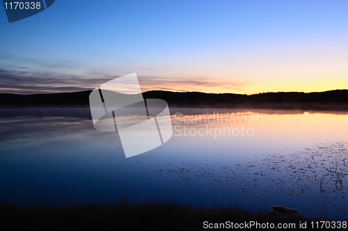 Image of Landscape of lake sunrise at dawn