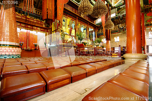 Image of rows of seats in chinese temple