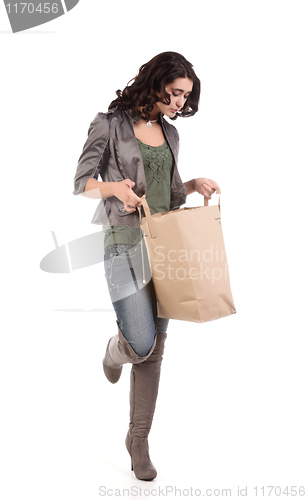 Image of young woman with shopping