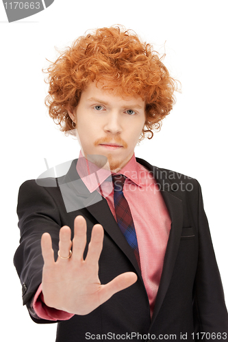 Image of man making stop gesture