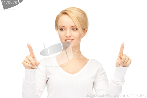 Image of businesswoman working with something imaginary