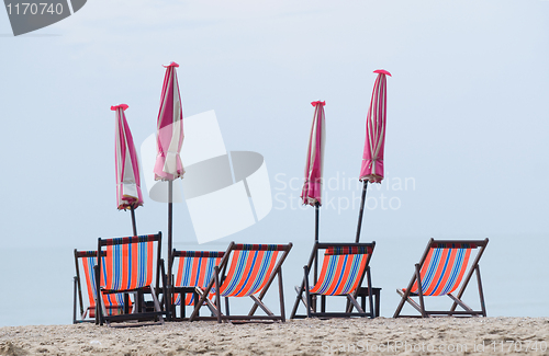 Image of Beach chairs and parasols