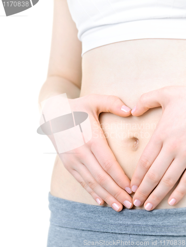 Image of Heart shaped hands on tummy