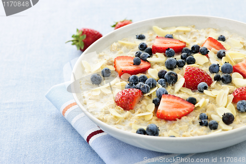 Image of Oatmeal breakfast cereal with berries