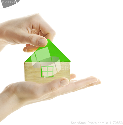 Image of Green wooden block house