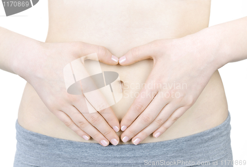 Image of Heart shaped hands on tummy