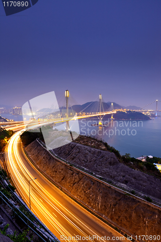 Image of highway and Ting Kau bridge at night