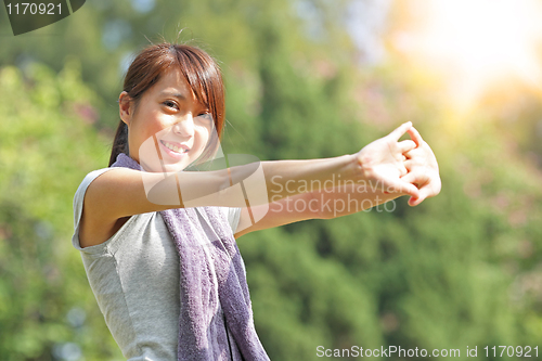 Image of woman doing stretching exercise