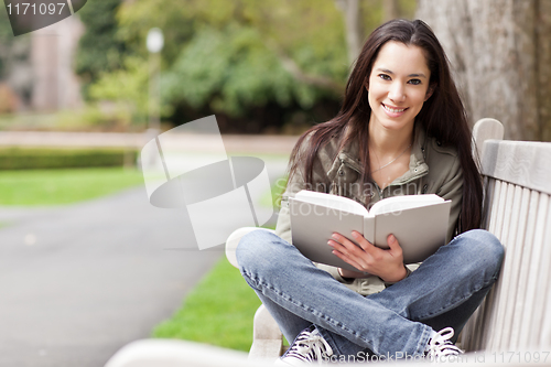 Image of Ethnic college student studying