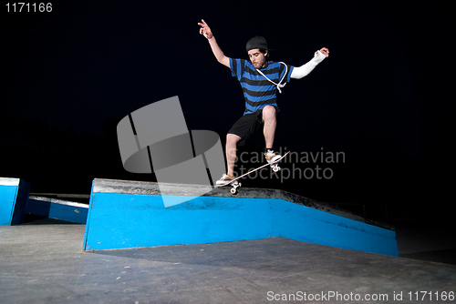Image of Skateboarder on a slide