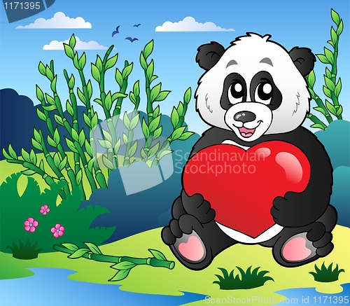 Image of Cartoon panda holding heart outdoor