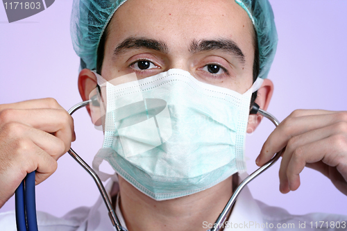 Image of Portrait of a young doctor with stethoscope.