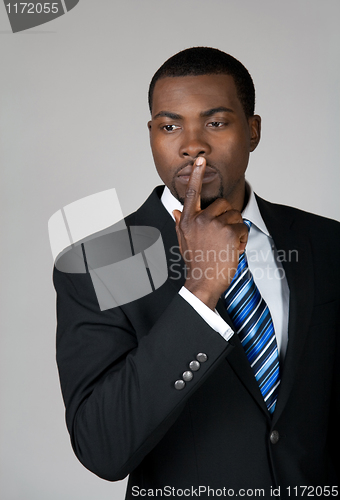 Image of Young business man thinking