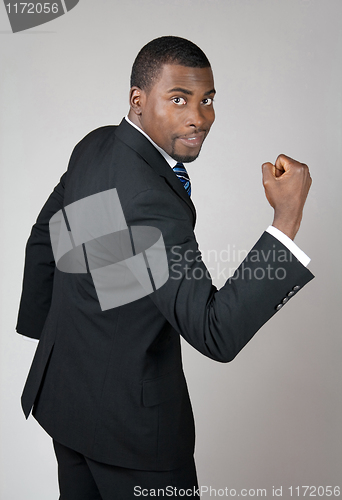 Image of Business man showing his strength