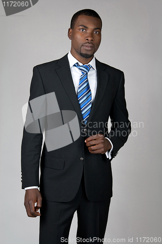 Image of Gentleman wearing suit and tie